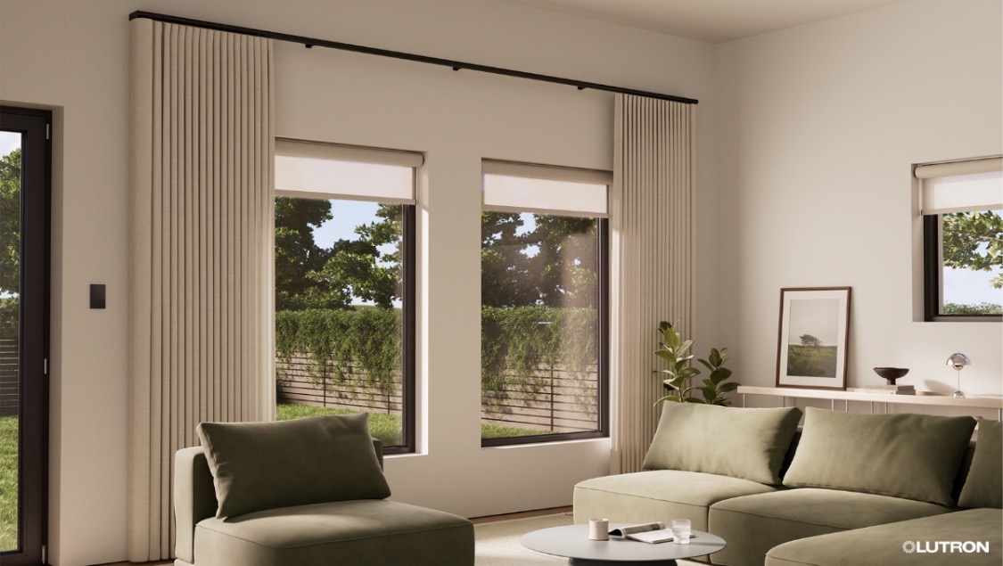 Motorized shades and drapery in a modern interior