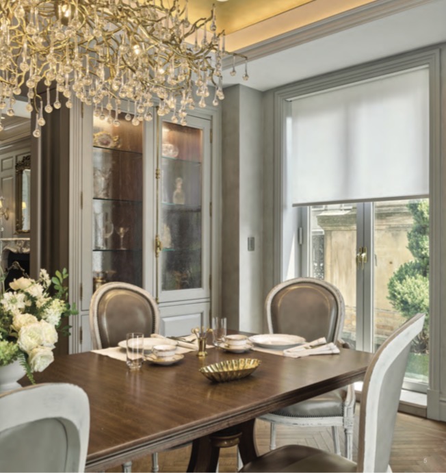Automated roller shade in luxury dining room